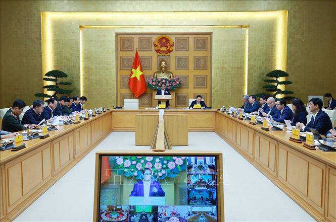 Cuộc họp về việc đẩy nhanh tiến độ triển khai “Chiến dịch Quang Trung”. Ảnh: Dương Giang/TTXVN