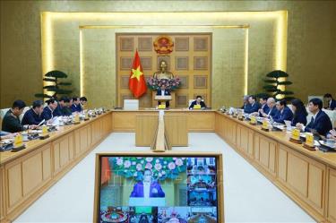 Cuộc họp về việc đẩy nhanh tiến độ triển khai “Chiến dịch Quang Trung”. Ảnh: Dương Giang/TTXVN